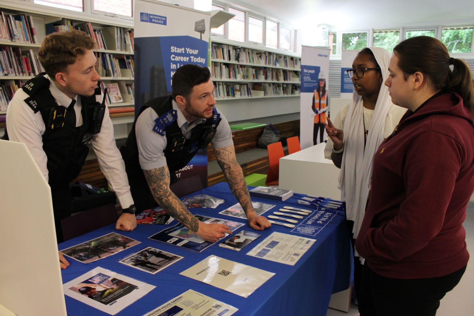 Police talking to students at the careers fair